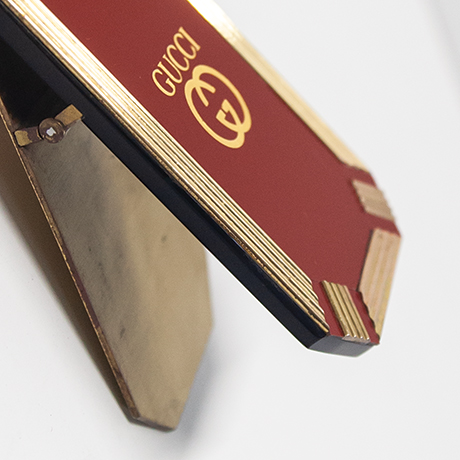 Gucci-Bueroklammer-rot-gold-messing